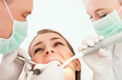 Clínica Dental Bell - Dent paciente en tratamiento dental